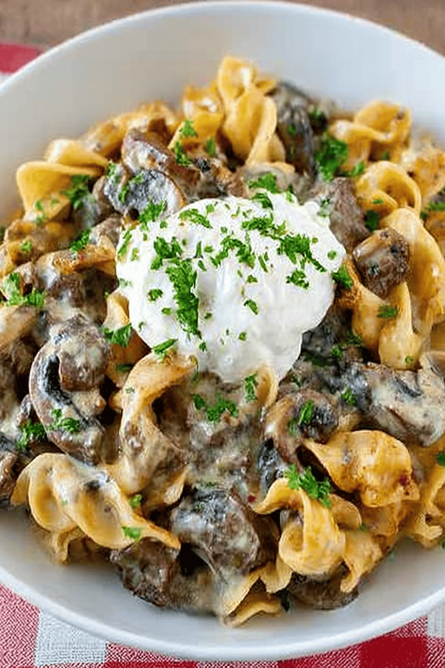 Beef Stroganoff Casserole Recipe slice on plate showing perfect texture and swirl pattern