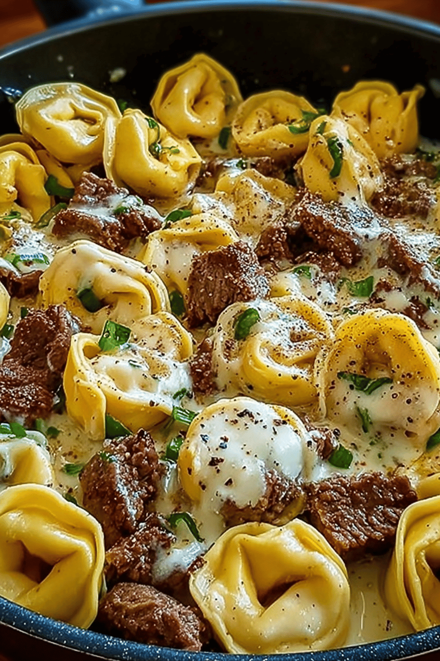 Cheesesteak Tortellini in a Creamy Provolone Cheese Sauce Recipe ingredients organized and measured on kitchen counter