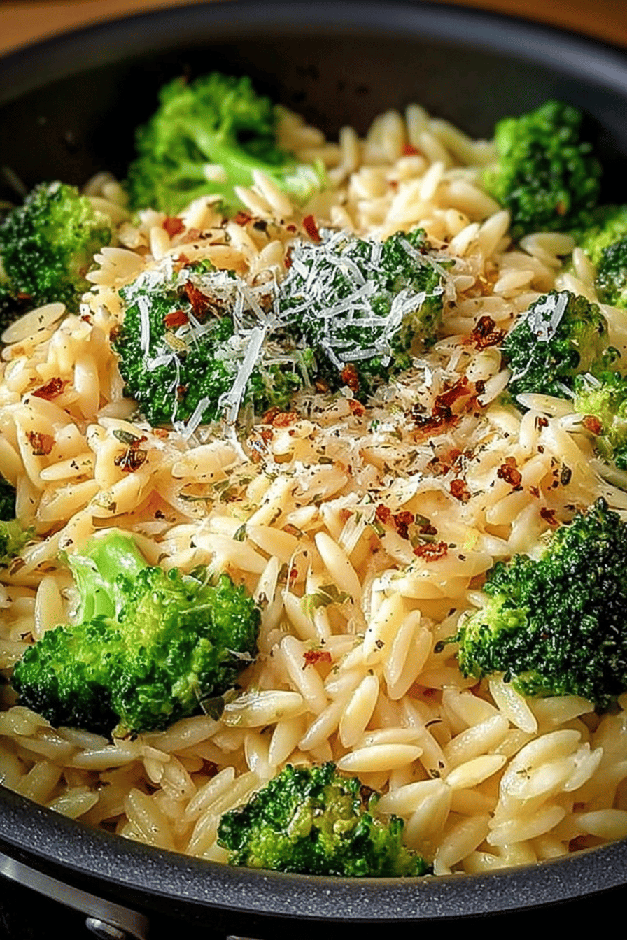 Creamy Orzo with Parmesan and Broccoli Recipe slice on plate showing perfect texture and swirl pattern