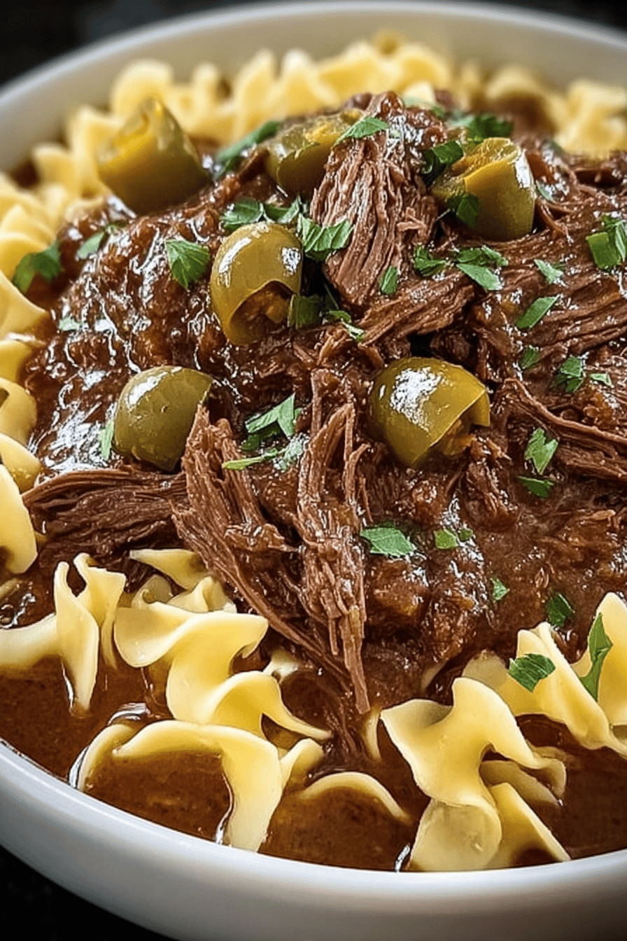 Crockpot Mississippi Beef and Noodles Recipe slice on plate showing perfect texture and swirl pattern