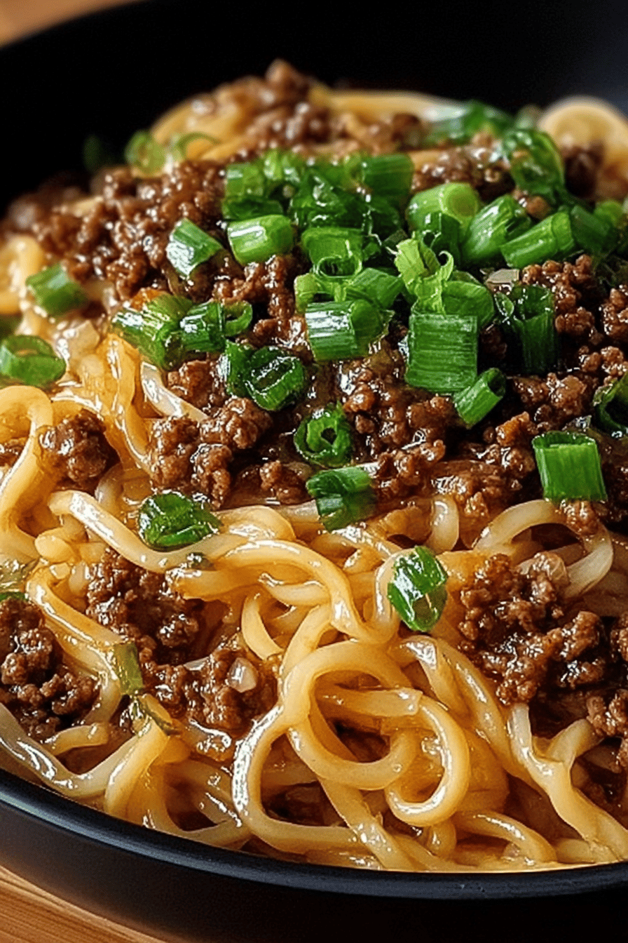 Mongolian Ground Beef Noodles Recipe slice on plate showing perfect texture and swirl pattern
