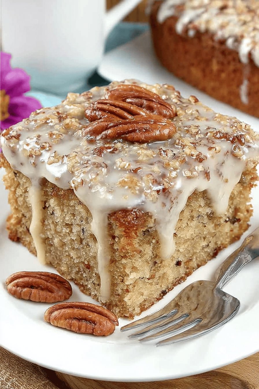 Pecan Praline Cake Recipe slice on plate showing perfect texture and swirl pattern