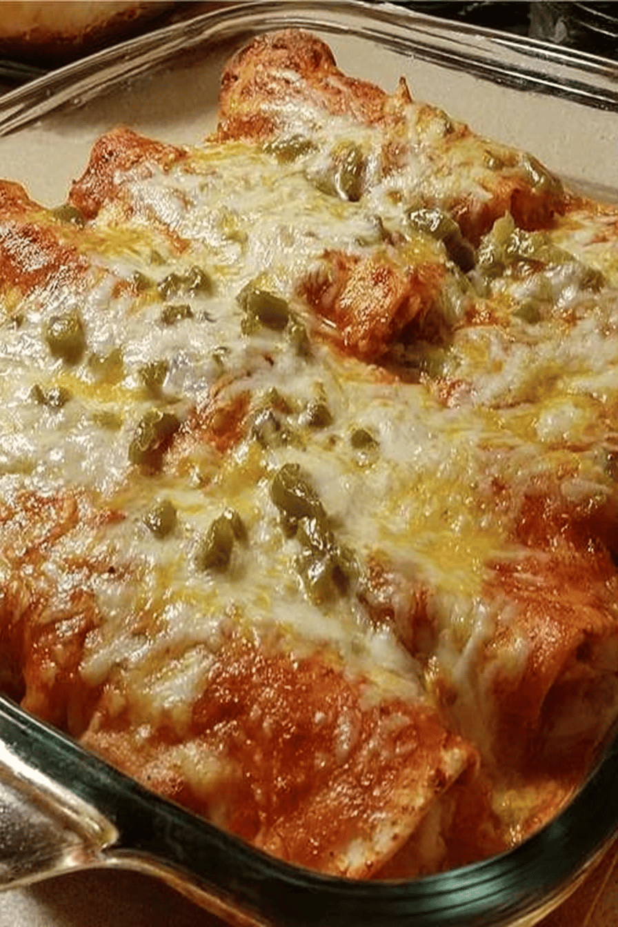 Sour Cream Chicken Enchiladas Recipe That Will Cast a Spell on Your Taste Buds slice on plate showing perfect texture and swirl pattern